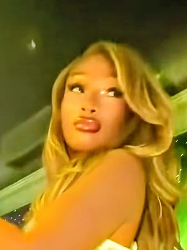 Megan Thee Stallion with honey blonde waves